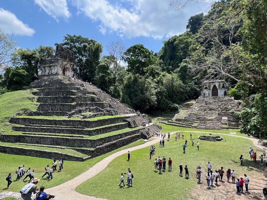 Tourists explore ruins at Palenque