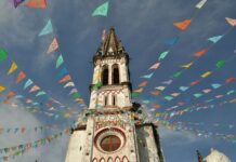 Cathedral with colored flags