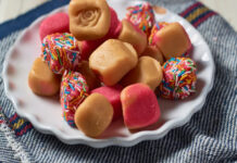 pieces of caramel-colored Mexican fudge, some tinted pink and some sprinkled with multicolored sprinkles
