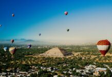 Hot air balloons float over one of the Teotihucán pyramids in México state
