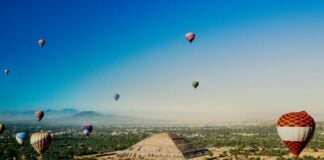 Hot air balloons float over one of the Teotihucán pyramids in México state