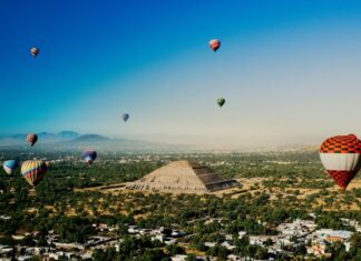 Hot air balloons float over one of the Teotihucán pyramids in México state