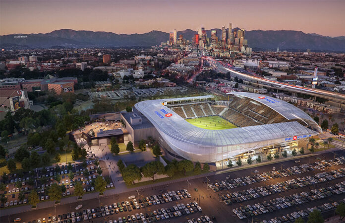 An aerial view of BMO Stadium and the Los Angeles skyline