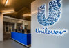 A Unilever logo at the entrance of an office