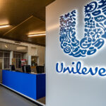 A Unilever logo at the entrance of an office