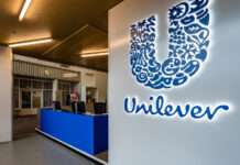 A Unilever logo at the entrance of an office