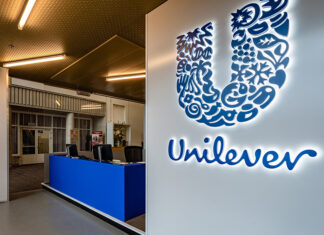 A Unilever logo at the entrance of an office