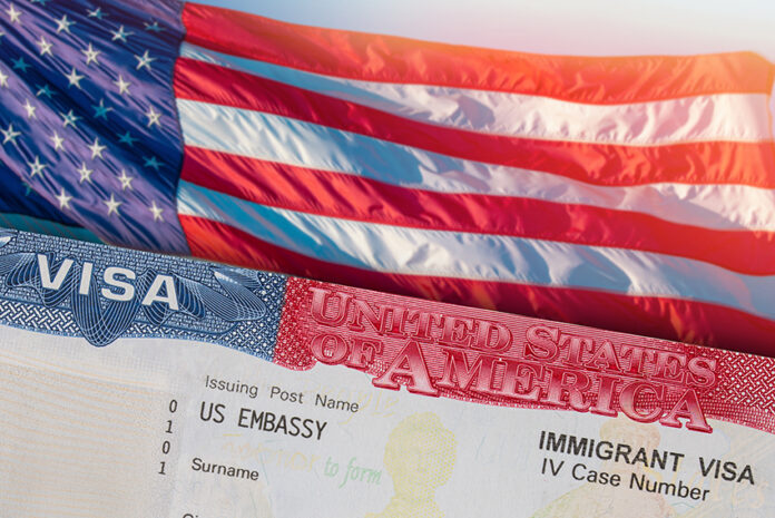 A US flag and visa