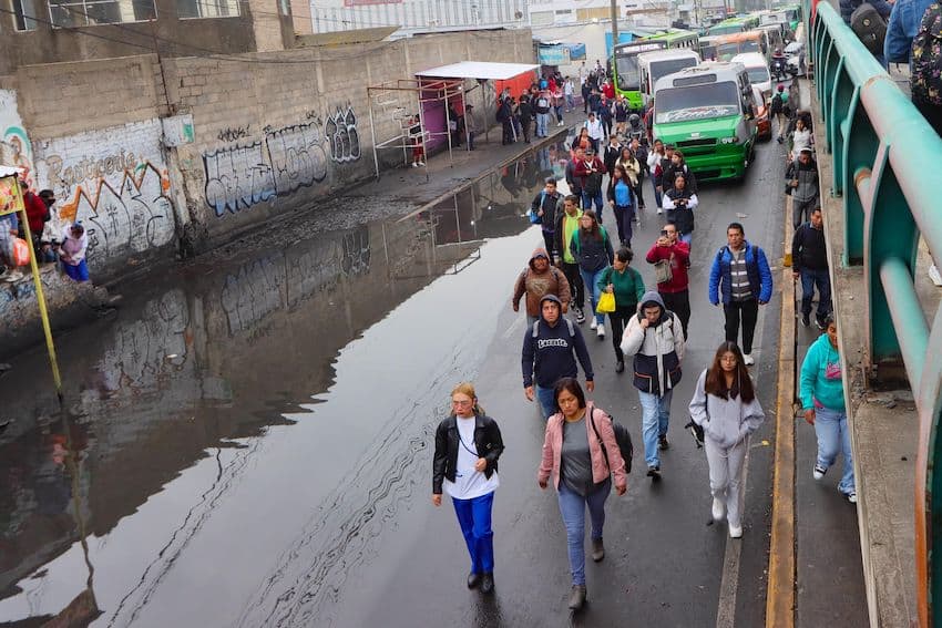 Metro passengers walking from the Guelatao presumption successful the Iztapalapa borough of Mexico City to the La Paz presumption successful México state, aft work connected portion of Line A of the capital's metro strategy was suspended connected Monday evening owed to flooding.