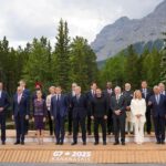 At the G7, Sheinbaum appeared between French President Macron and Australian Prime Minister Anthony Albanese in an official leaders' photo.