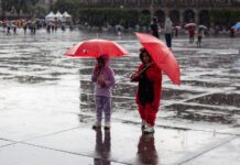 2 people with rain umbrellas