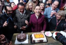 At the end of her press conference, Sheinbaum shared cake with the scores of reporters and other people in attendance