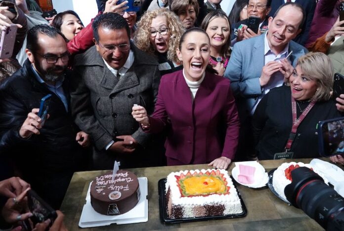 At the end of her press conference, Sheinbaum shared cake with the scores of reporters and other people in attendance