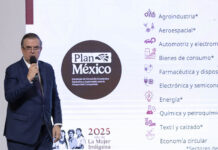 Economy Minister Marcelo Ebrard shares a slide reading Plan Mexico at a press conference