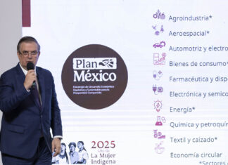 Economy Minister Marcelo Ebrard shares a slide reading Plan Mexico at a press conference