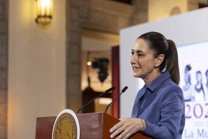 President Claudia Sheinbaum at the podium of her morning press conference