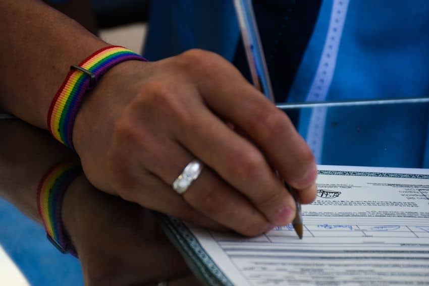 Signing a marriage certificate