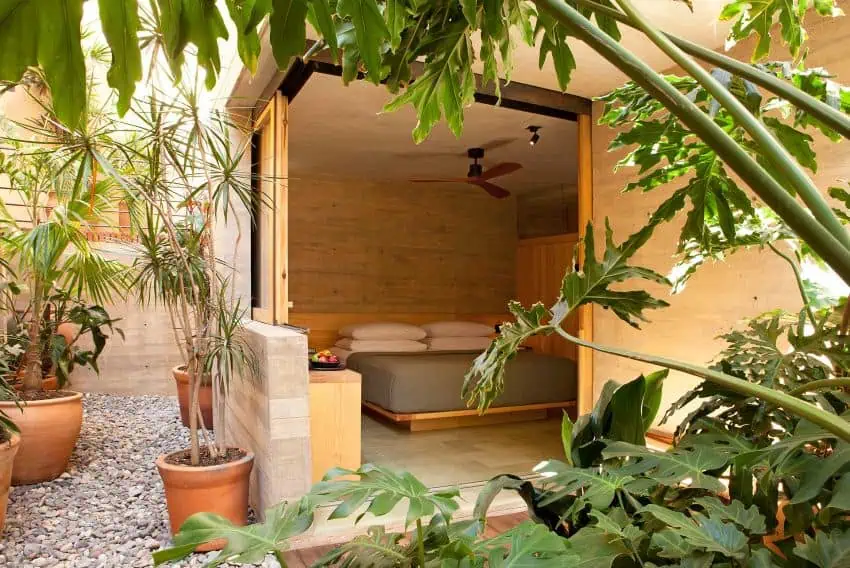 Hotel bed and open courtyard