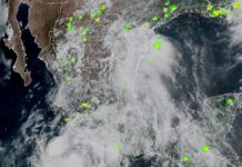 At 9 a.m. on Monday, Flossie was centered about 160 miles (255 kilometers) south of Zihuatanejo, Guerrero, and was moving parallel to Mexico's southwestern coastline at 10 mph (16 kph).
