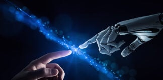 An AI robot hand reaches out to touch a human hand