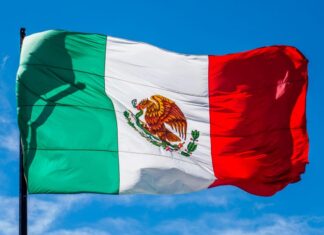 Mexican flag waving from a pole