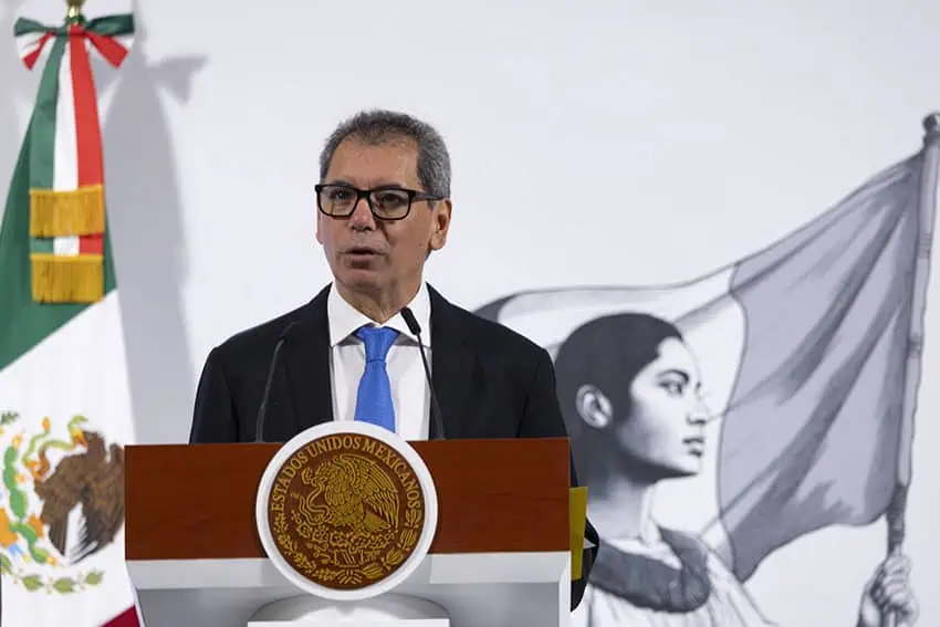 Mexican Finance Minister Edgar Amador stands a podium