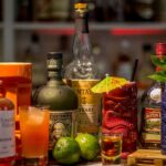 Bottles of liquor and cocktails on a great Mexico City cocktail bar.