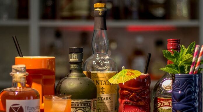 Bottles of liquor and cocktails on a great Mexico City cocktail bar.