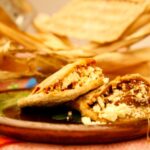 Two gorditas on a ceramic plate