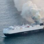 ship on fire n ocean
