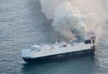 ship on fire n ocean