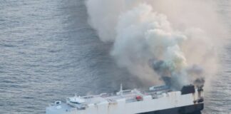 ship on fire n ocean