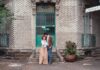 Couple stands on street corner in Mexico City