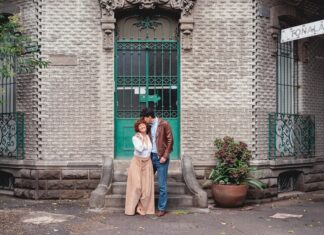 Couple stands on street corner in Mexico City