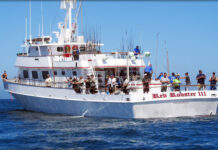 Sport fishers cast off the fishing boat Red Rooster III