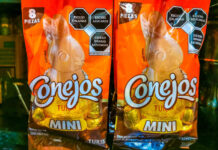 Two orange packages of the Mexican candy Conejos, a brand of rabbit-shaped chocolates, for sale in Puerto Escondido, Oaxaca.