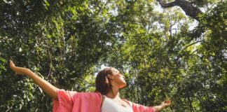 A woman with outstretched arms