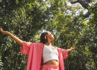 A woman with outstretched arms