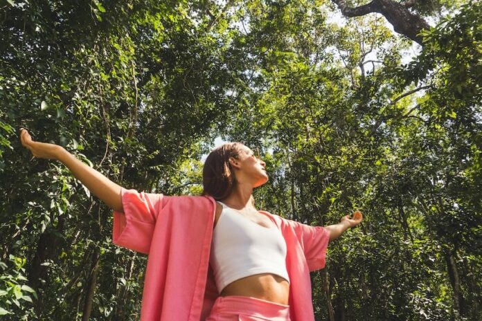 A woman with outstretched arms
