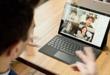 A man in a remote work meeting