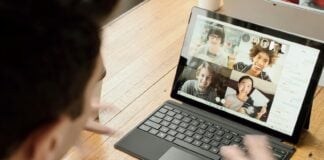 A man in a remote work meeting