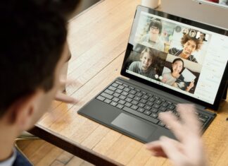 A man in a remote work meeting