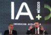 two men at podium with IA (AI in English) iage behind them.