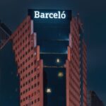 skyscraper with Barceló logo
