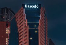 skyscraper with Barceló logo