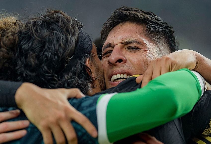 Edson Álvarez, 27, celebrates with goalkeeper Guillermo Ochoa.