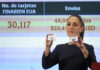 Sheinbaum displays a Finabien bank card