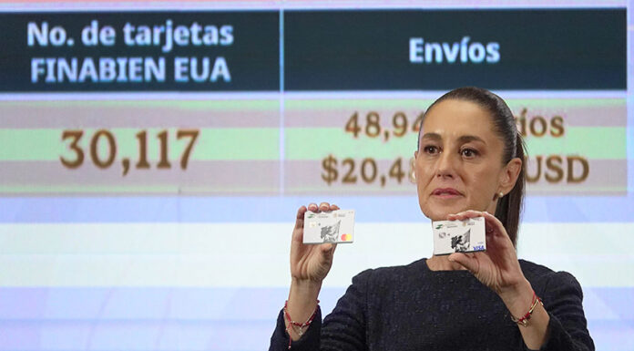 Sheinbaum displays a Finabien bank card