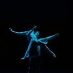 two ballet dancers in the dark