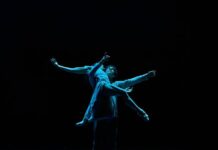 two ballet dancers in the dark